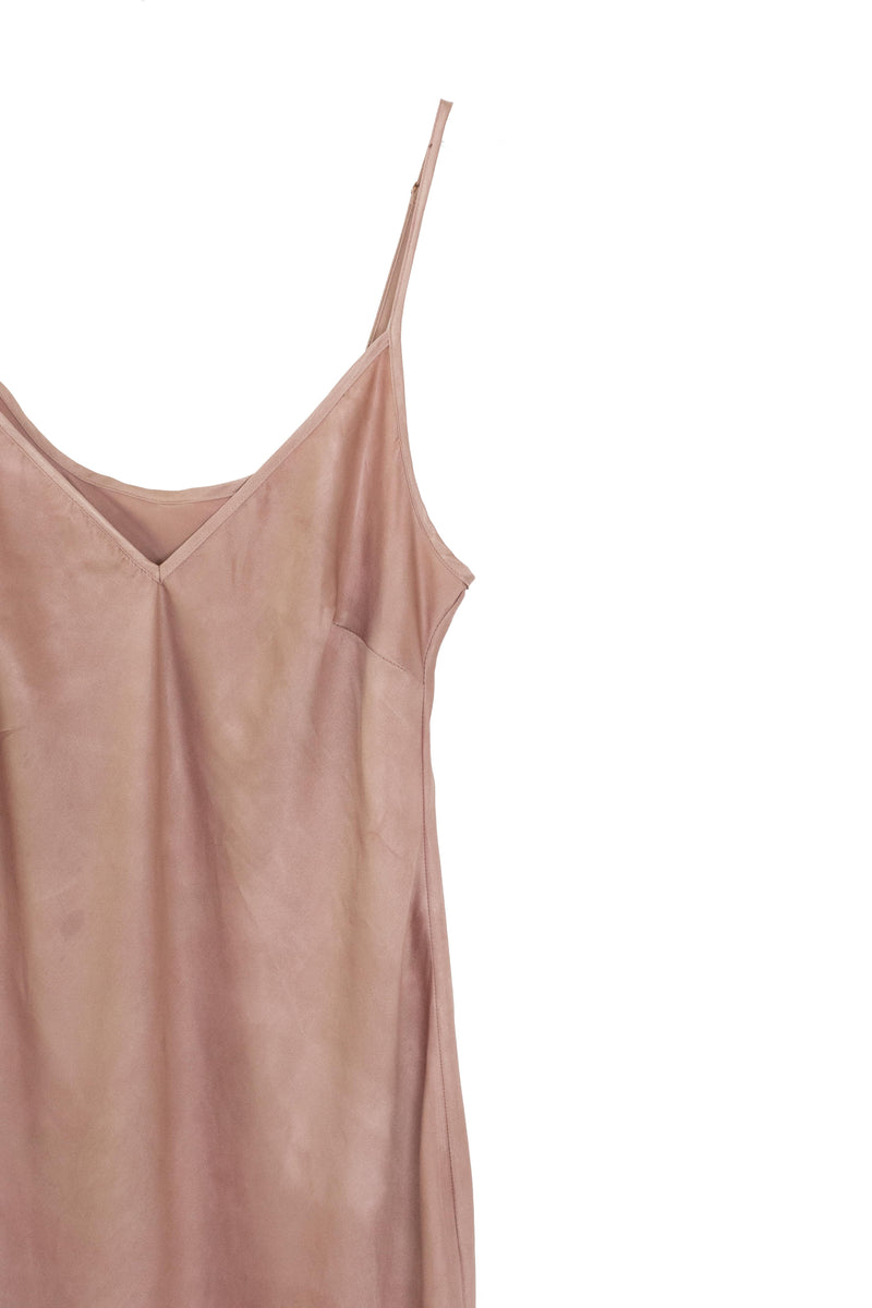 detail of silk midi dress in muted pink
