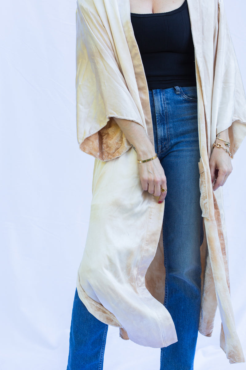 detail photo of reverse silk side of duster in marble stone