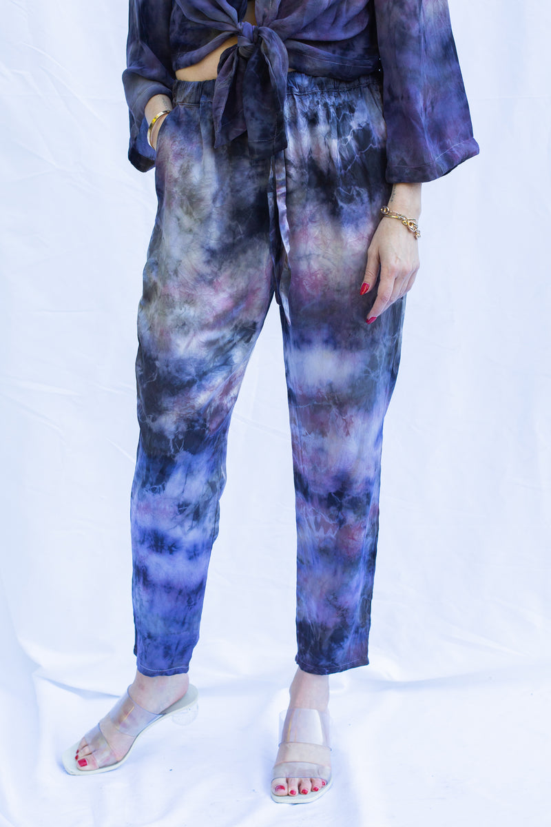 Front detail view of dharma pants in cosmica. 