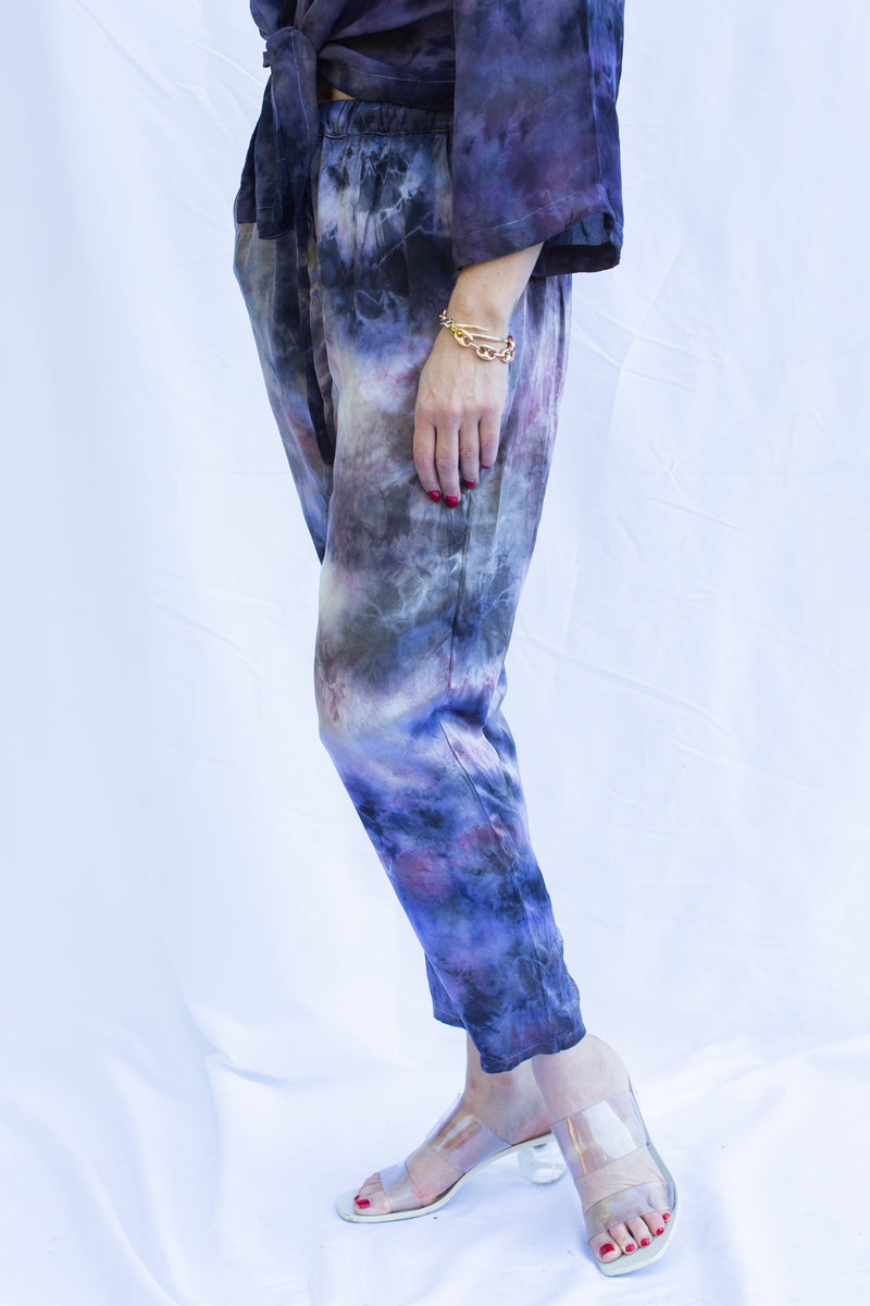 Detail side view of dharma pants in cosmica.