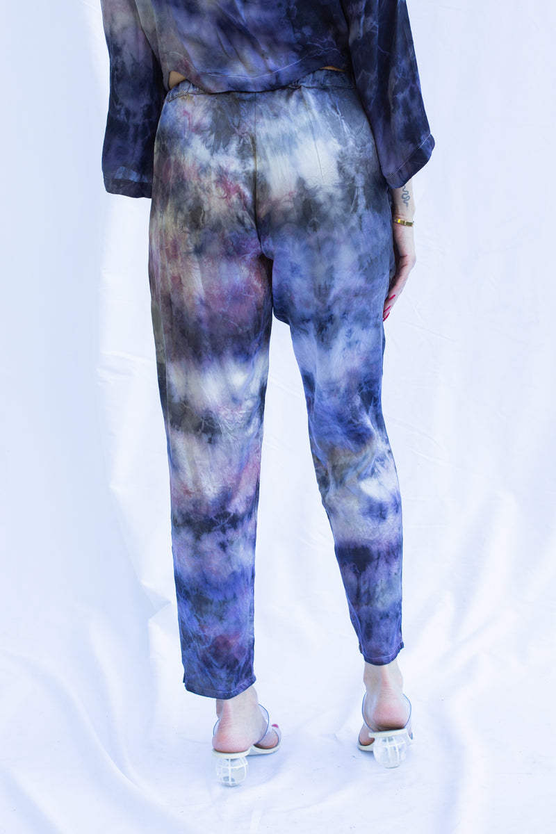 Close up back view of dharma pants in cosmica. 