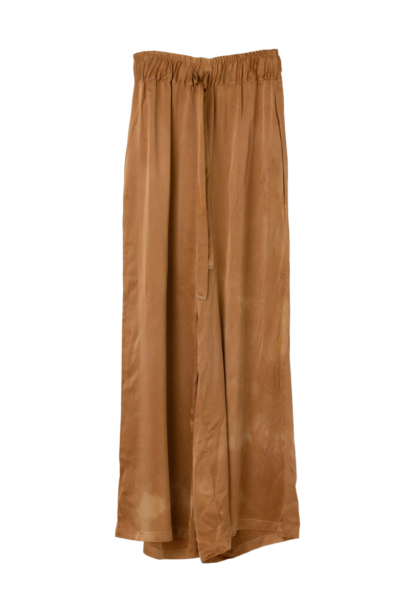 front of silk wide leg drawstring pants in muted copper color