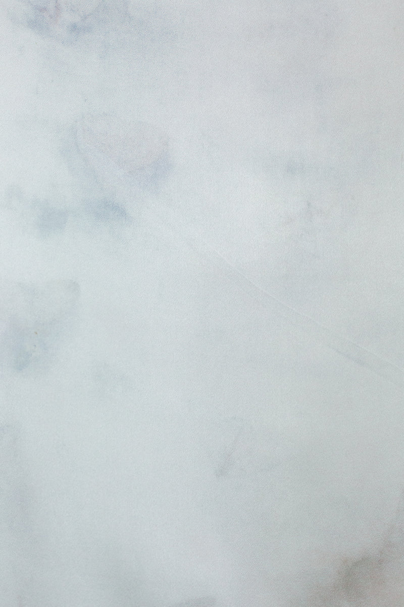 color swatch of medium silk scarf in light ice blue with darker blue grey markings