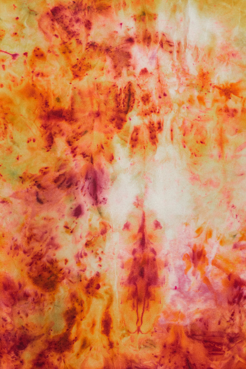 color swatch of Silk Square Scarf with orange, red, and yellow unique markings